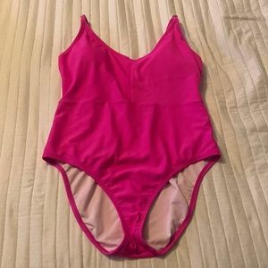 Hot pink one piece swimsuit.